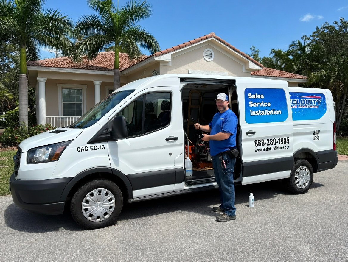 Velocity Air technician completing a clean AC repair